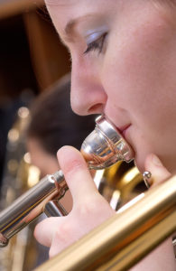 trombone-player-close up-art's music shop